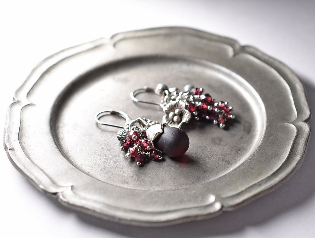 Ansymmetry earrings of dark red wedding beads and heavy garnet, flower Karen Silver and small bell - 耳环/耳夹 - 玻璃 红色