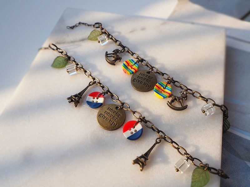 never give up 永不放弃 英文字牌 小木马巴黎铁塔钮扣【换季特卖 - 手链/手环 - 其他金属 咖啡色