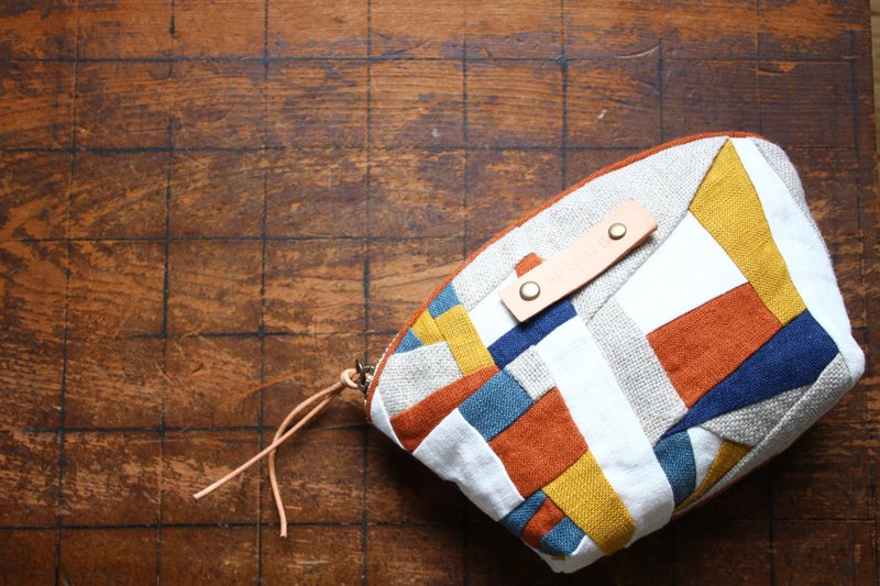 The zipper pouch of a linen patchwork/orange - 化妆包/杂物包 - 棉．麻 橘色