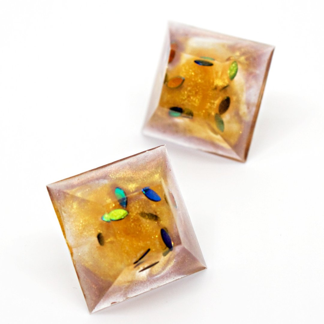 Half pyramid earrings (shining pumpkin dumplings) - 耳环/耳夹 - 树脂 橘色