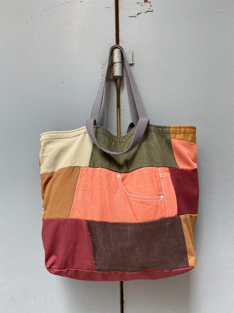 独特牛仔裤weekend bag - 手提包/手提袋 - 棉．麻 多色
